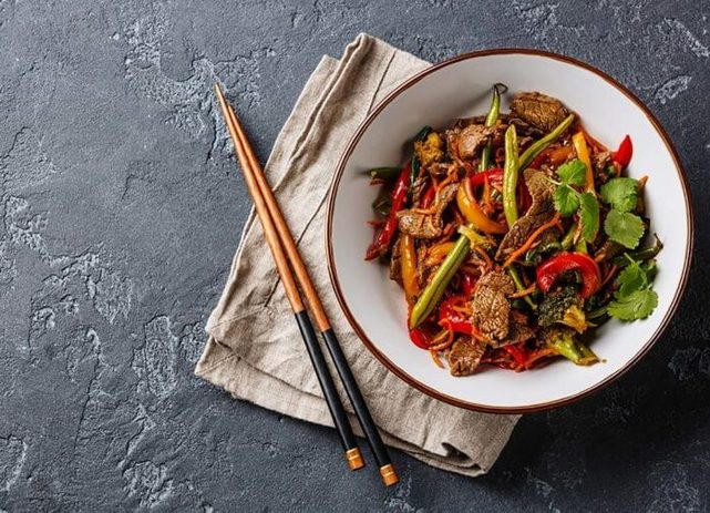 beef stir-fry with chopsticks