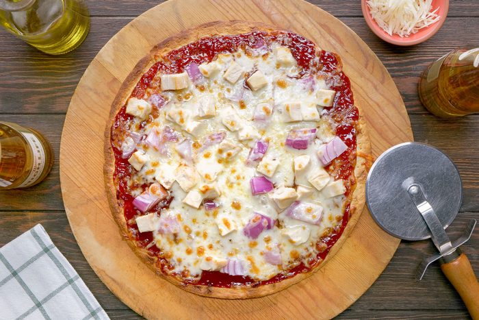 Barbecue Chicken Pizza on a Wooden Pizza Plate