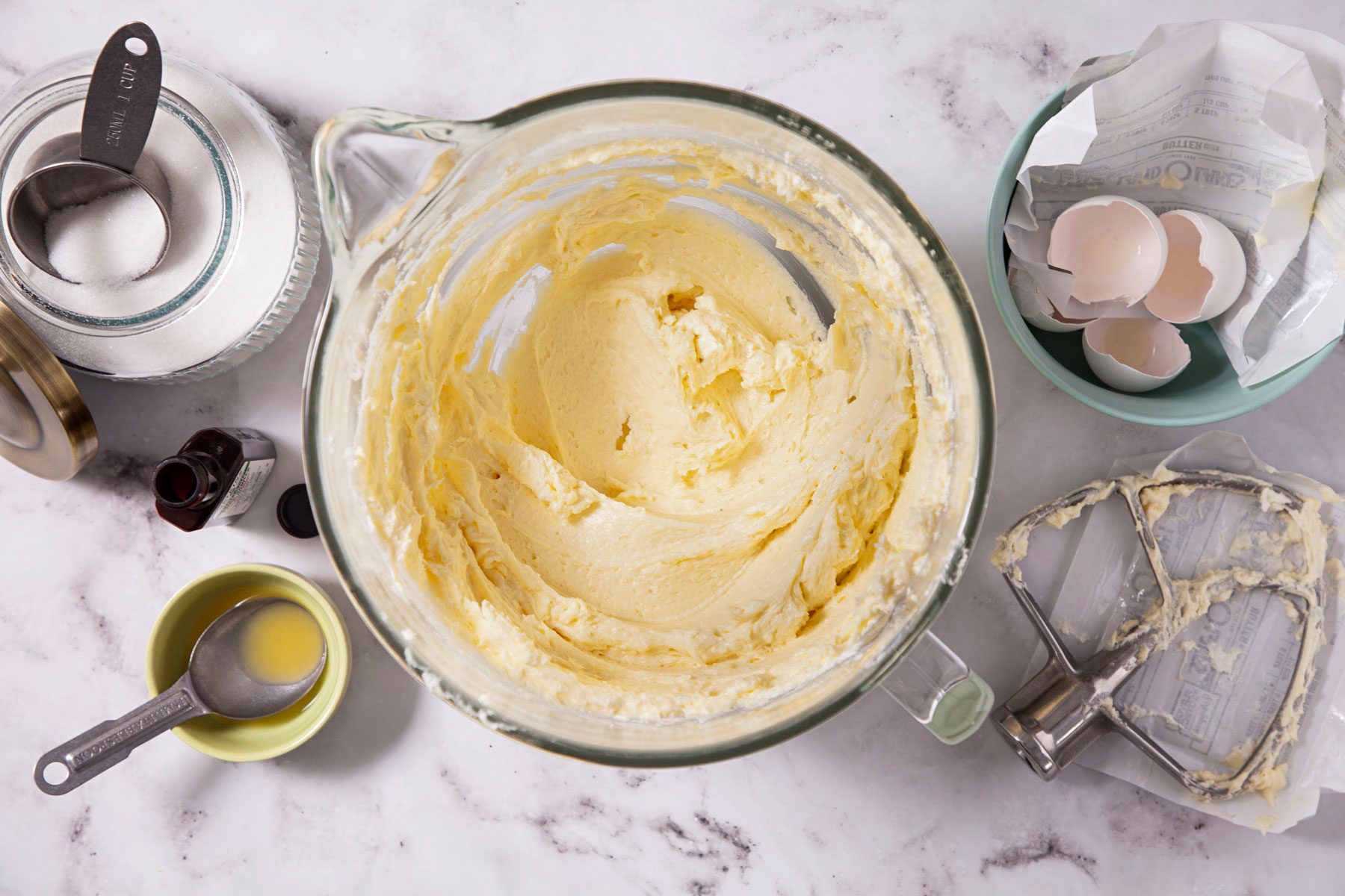 Cream, butter, sugar and eggs mixed in a bowl