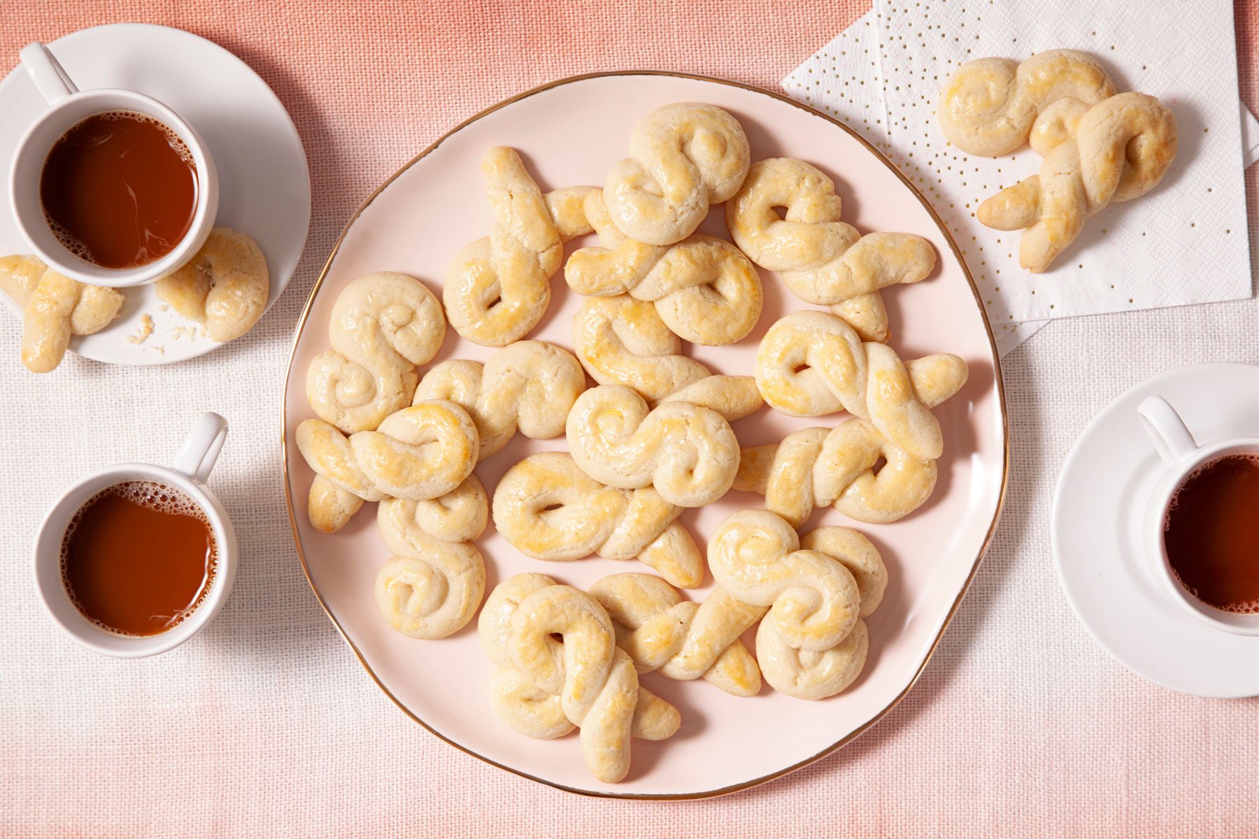 Greek Holiday Cookies served with coffee in a large plate