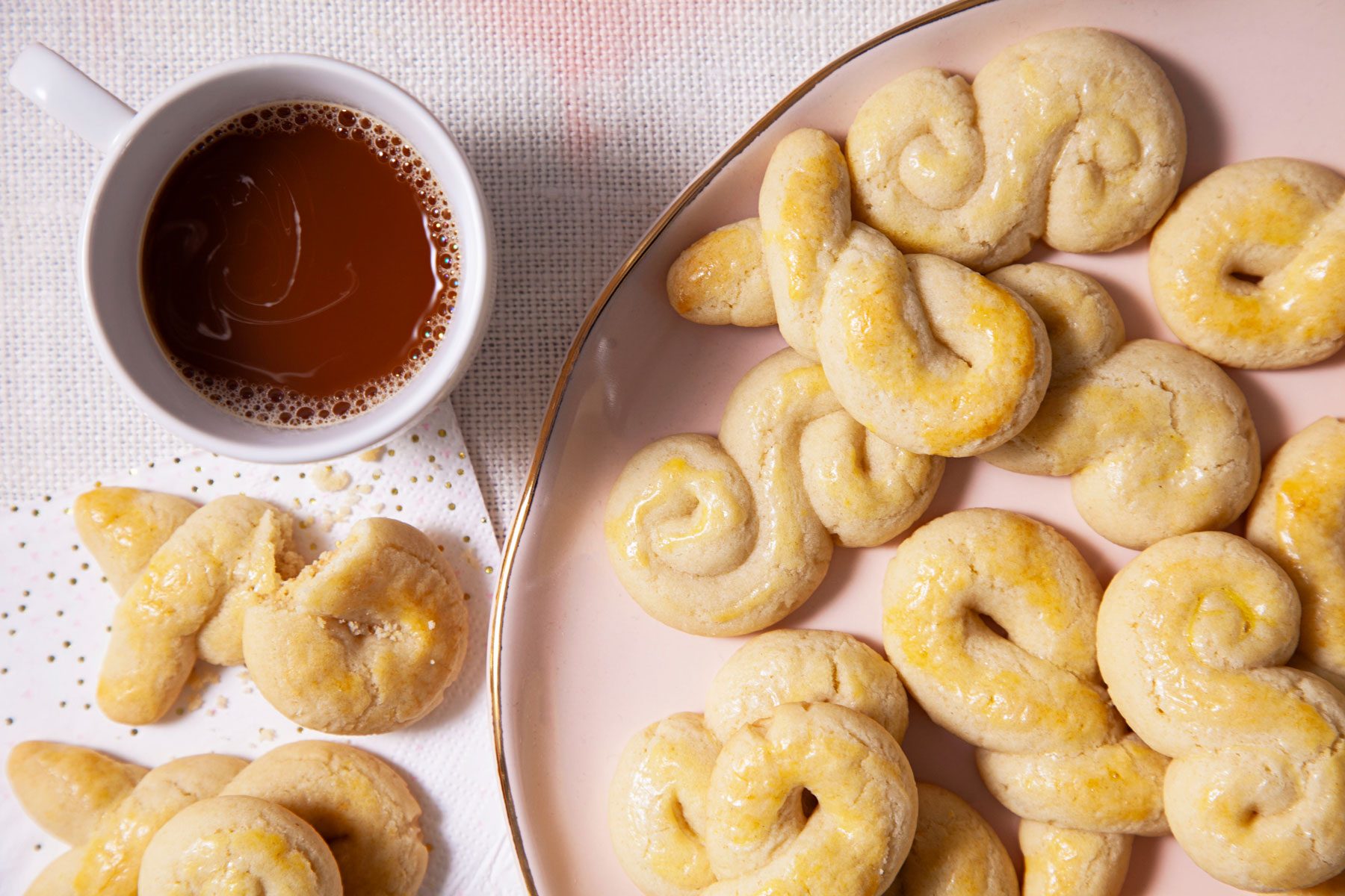 Greek Holiday Cookies with black coffee on a table