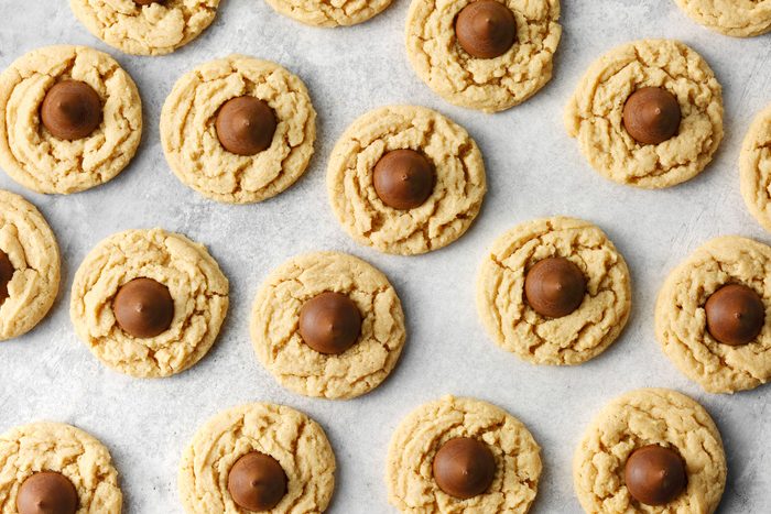 Peanut Butter Blossom cookies on a white marble