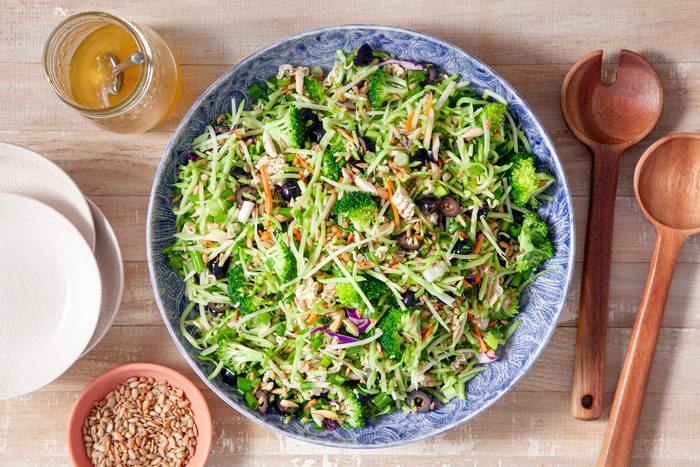 Ramen Coleslaw in a Fancy Blue Plate on Wooden Surface