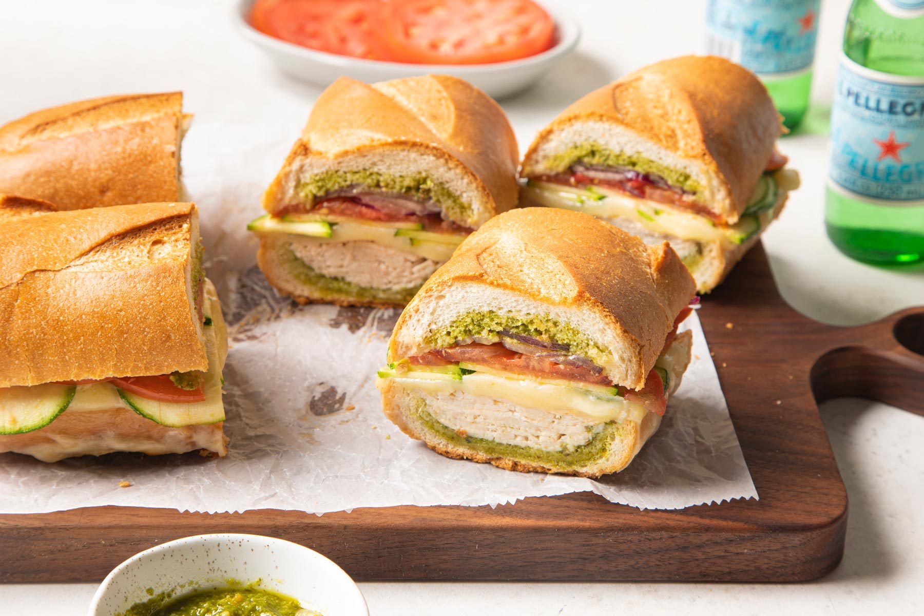 Turkey Pesto Sandwiches on a Wooden Board