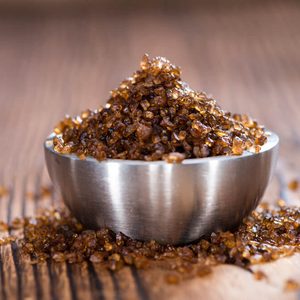 Portion of Smoked Salt on wooden background