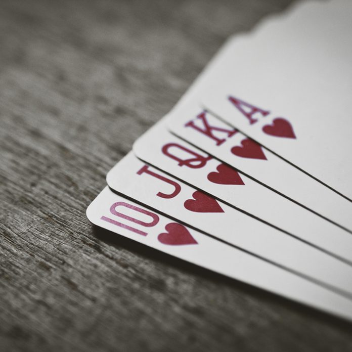 Closeup of heart royal flush the highest ranking hand in hold