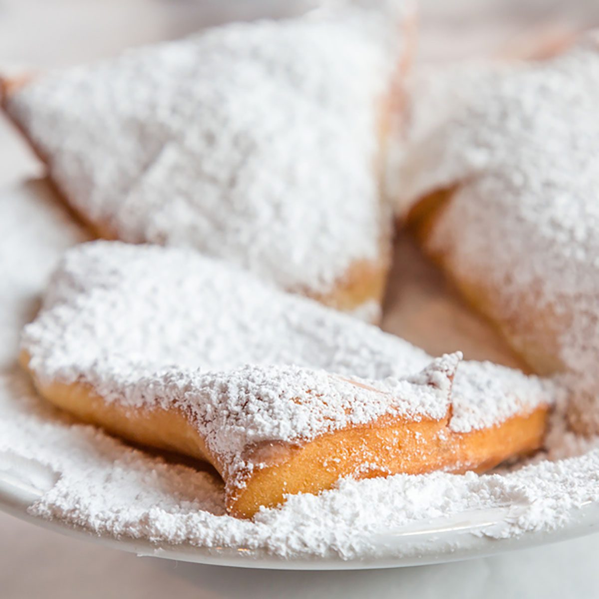 Beignets on Plate with powdered sugar