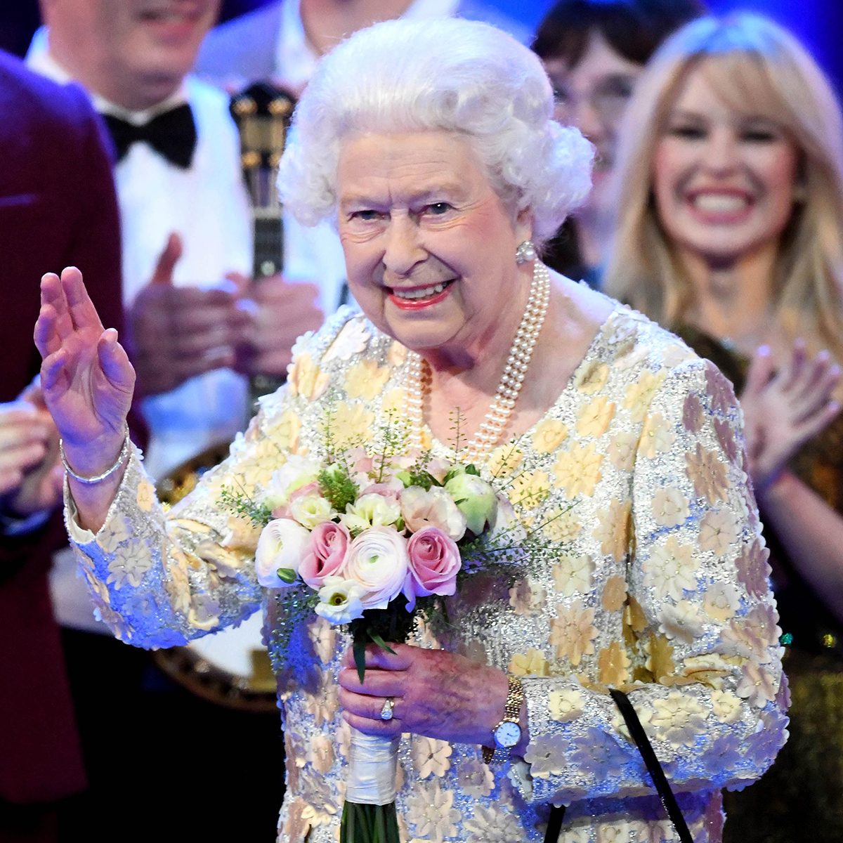 Mandatory Credit: Photo by REX/Shutterstock (9638987bt) Queen Elizabeth II surrounded by guests on stage at the Royal Albert Hall in London during a star-studded concert to celebrate the Queen