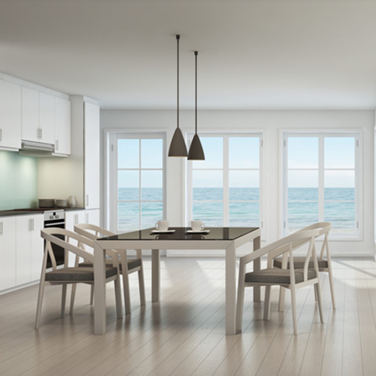 Sea view dining, living room and kitchen in beach house