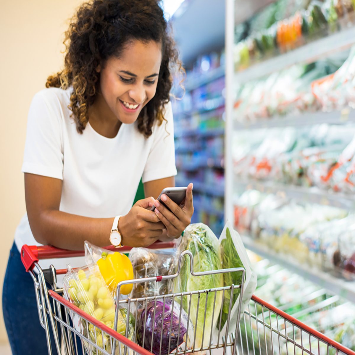 Woman shopping vegetables at the supermarket