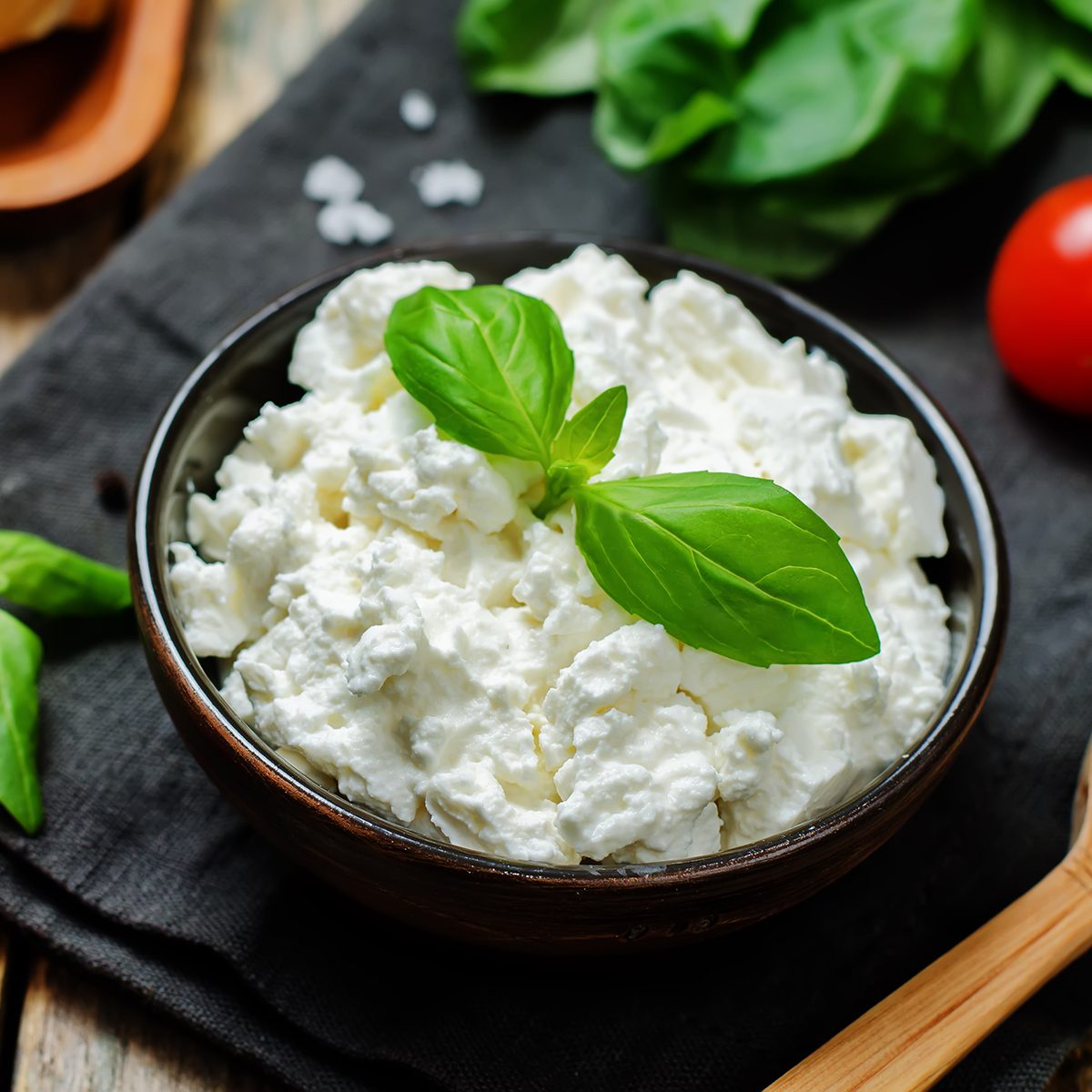 ricotta cheese on a wood background. the toning. selective focus