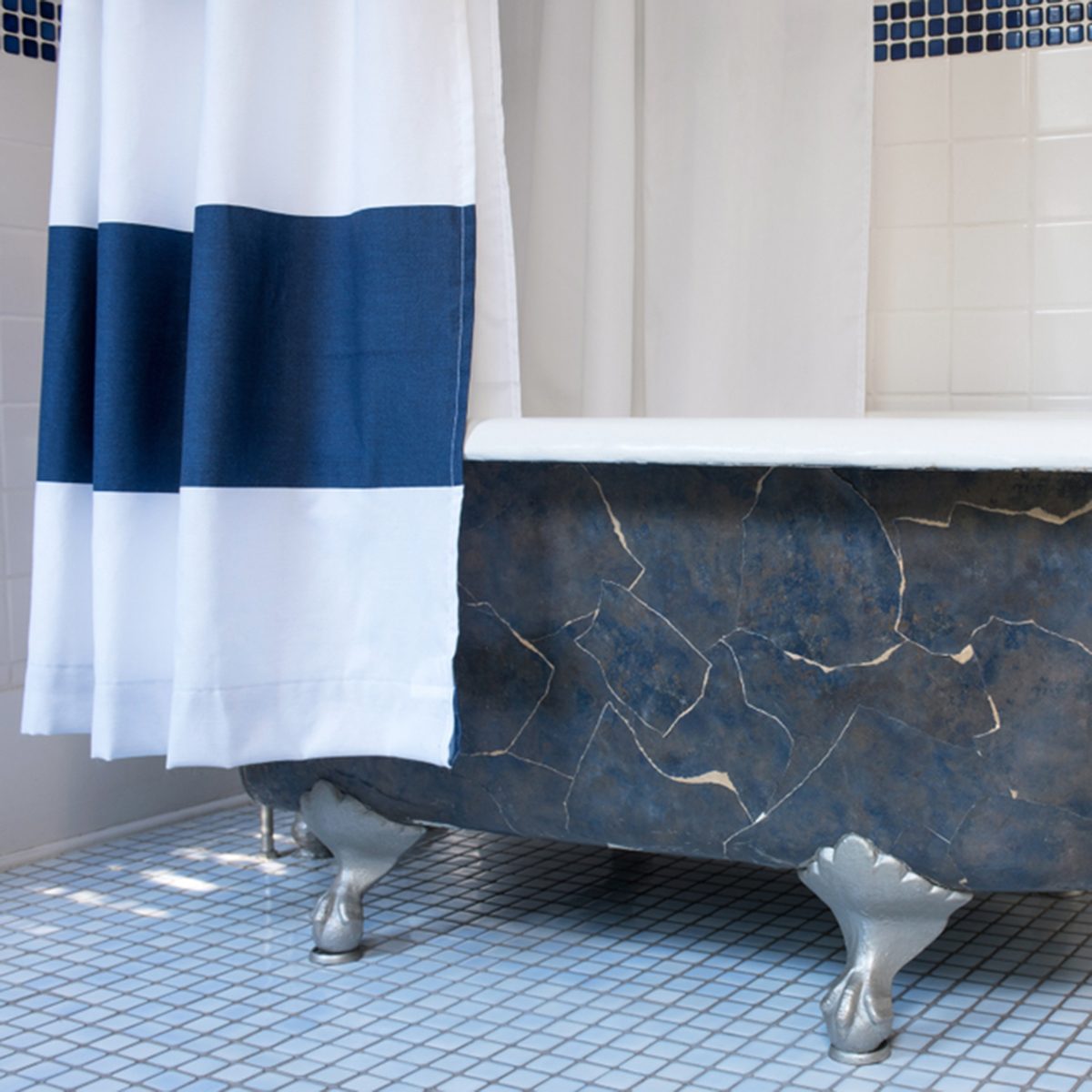 Clawfoot Bathtub with Platinum Claw Feet; Shutterstock ID 1130542595; Job (TFH, TOH, RD, BNB, CWM, CM): TOH