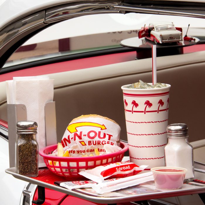 Depiction In-N-Out Burger drive-in restaurant at Pasadena Police Classic Car Show.