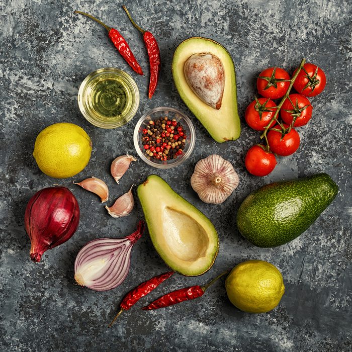 Fresh vegetables for cooking on dark background.