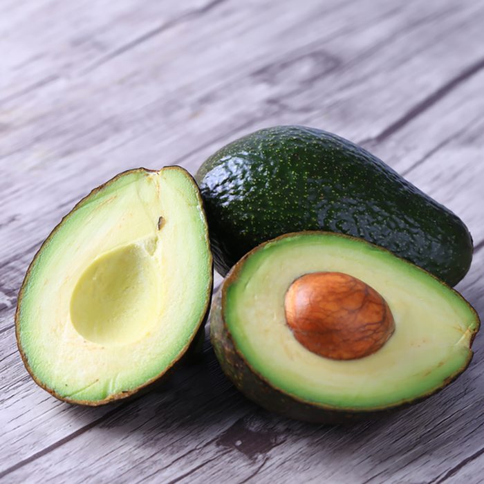 Fresh avocado on a wooden table