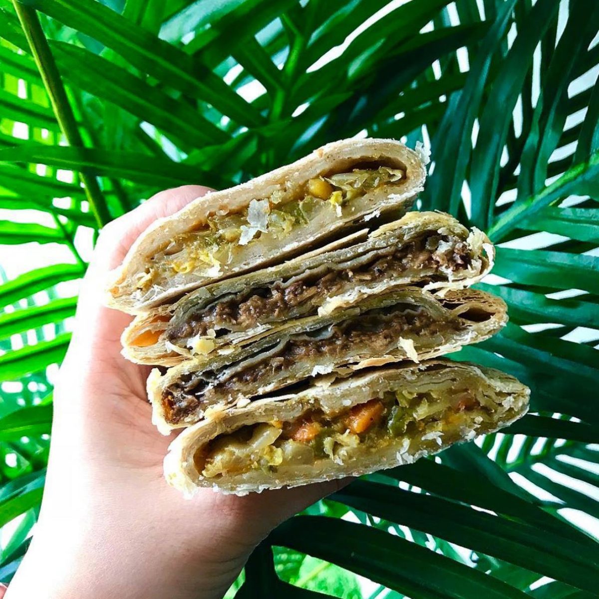 Golden Krust patties in hand