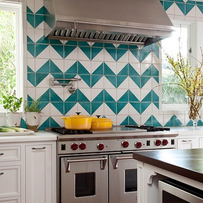 Teal and white chevron pattern backsplash