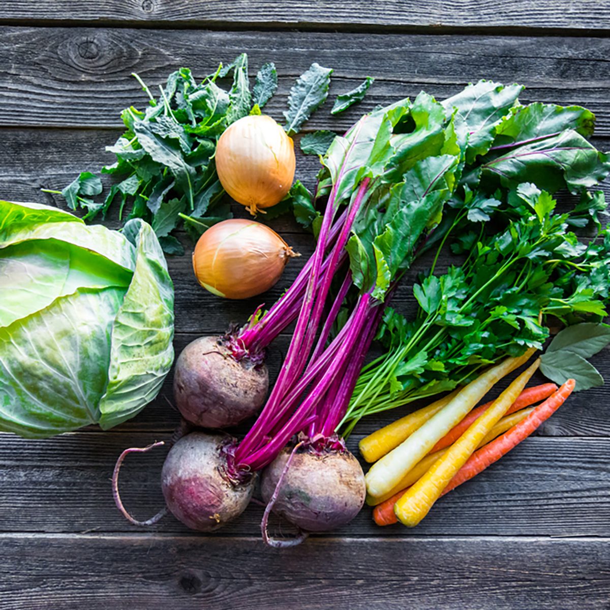 Fresh organic produce. Cabbage, Beets, Carrots, Onions, Kale and Parsley
