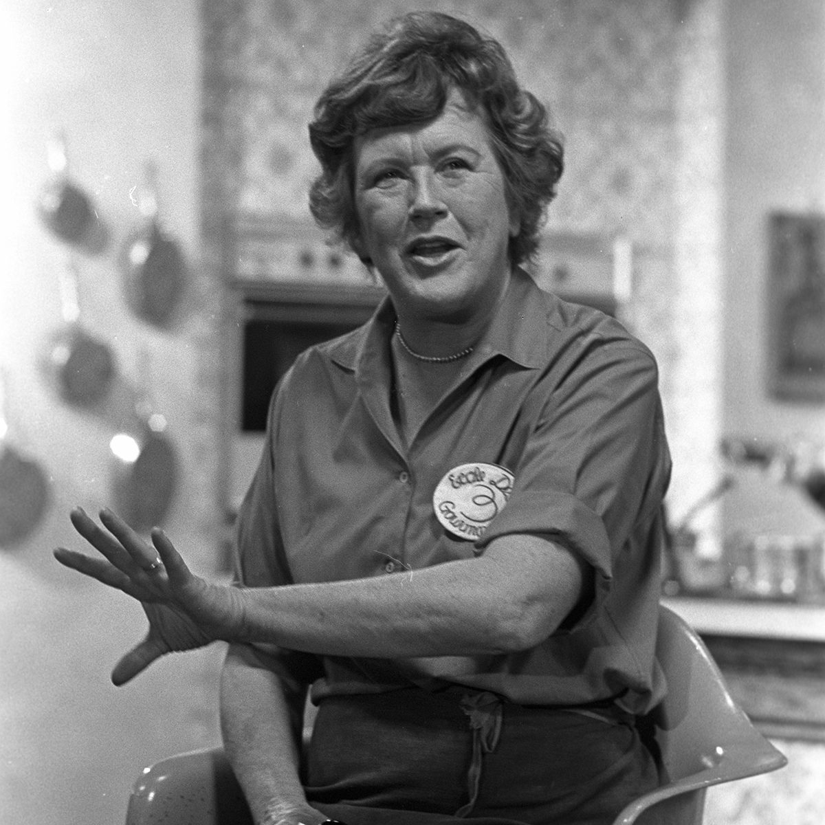 Julia Child cooking on the set of her WGBH cooking show, 