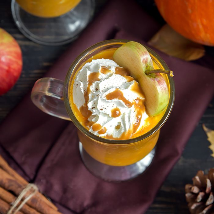 Apple Cider Floats with caramel sauce and pumpkin pie spices.