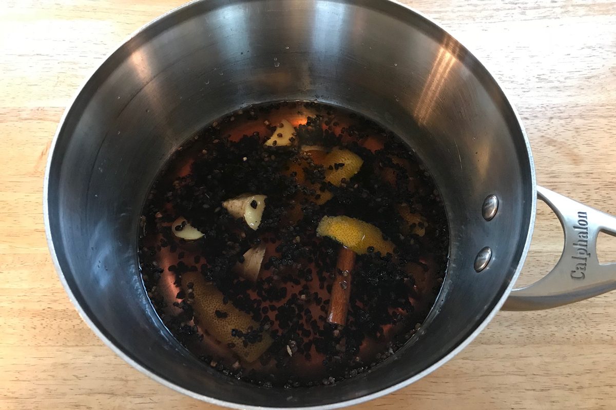 elderberry syrup in a pan