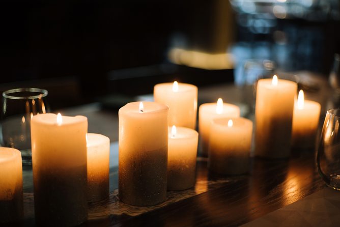 Candles on a table; Shutterstock ID 719781571; Job (TFH, TOH, RD, BNB, CWM, CM): TOH Power outage