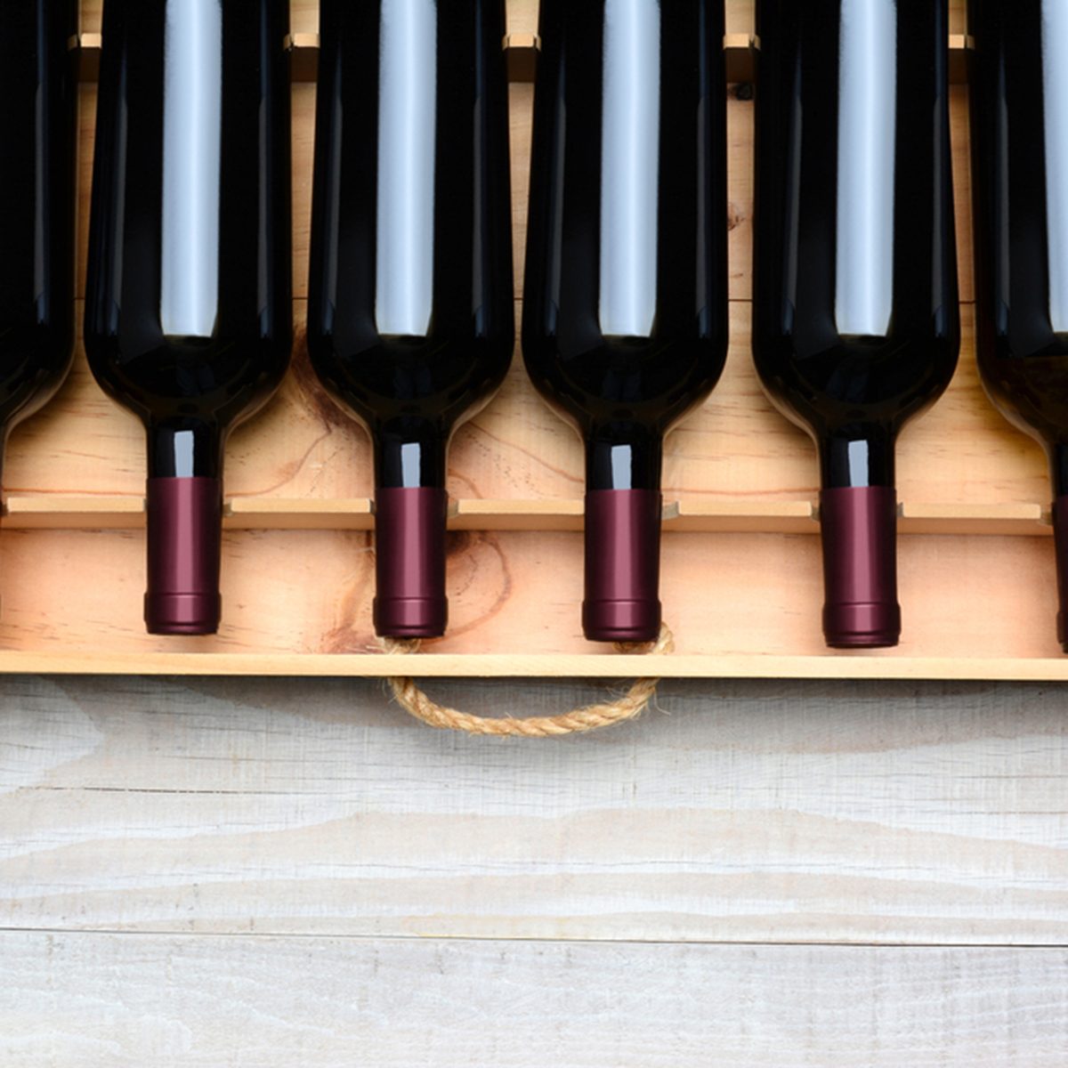 Wine crate with six bottles without labels.