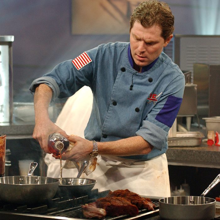 Mandatory Credit: Photo by JIM COOPER/AP/REX/Shutterstock (6405851a) Iron Chef Bobby Flay of Mesa Grill in New York works on the grill during the taping of the