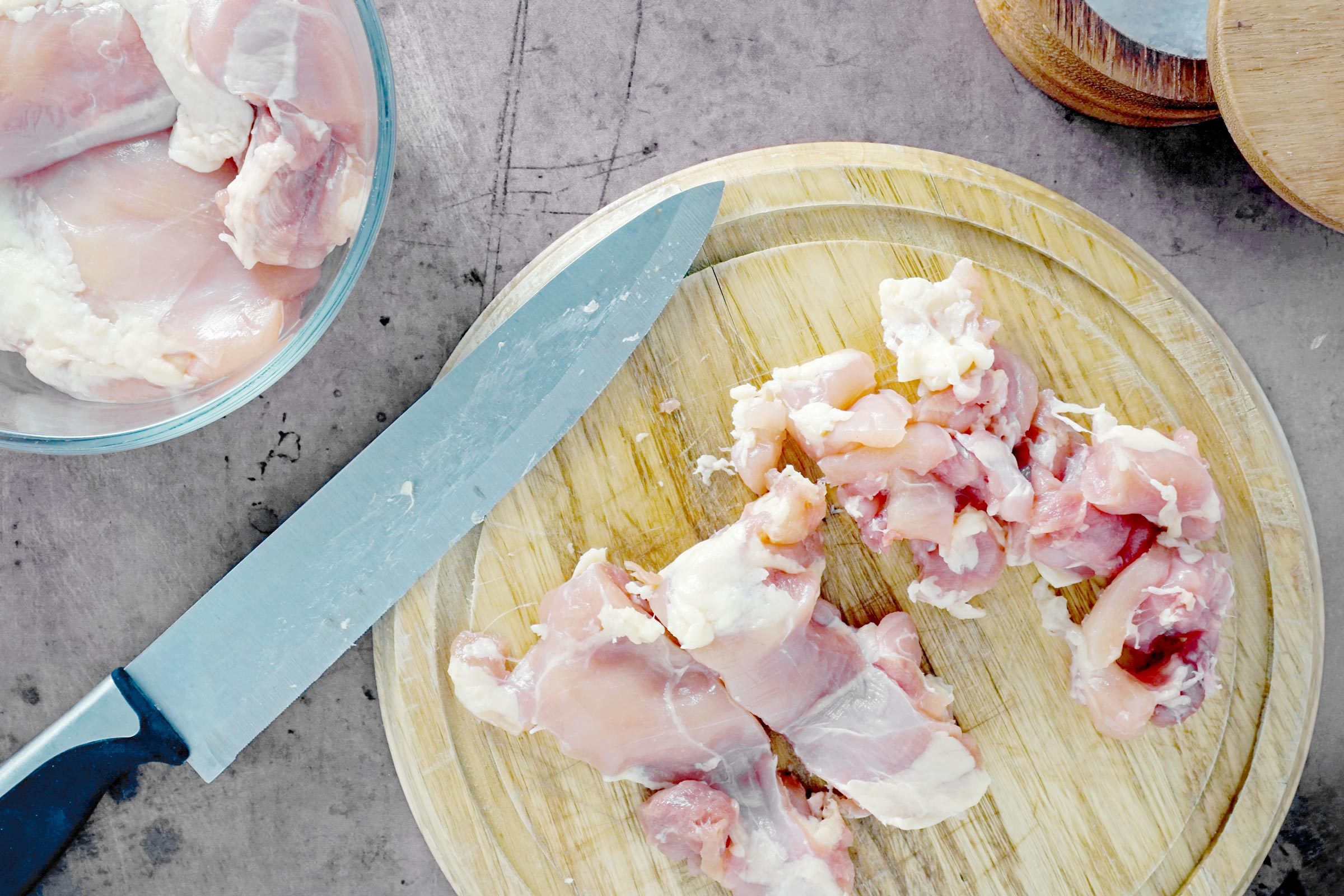 Raw chicken on a cutting board
