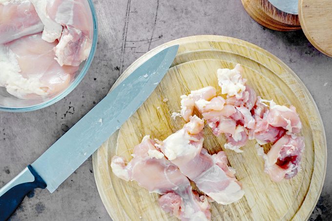 Raw chicken on a cutting board
