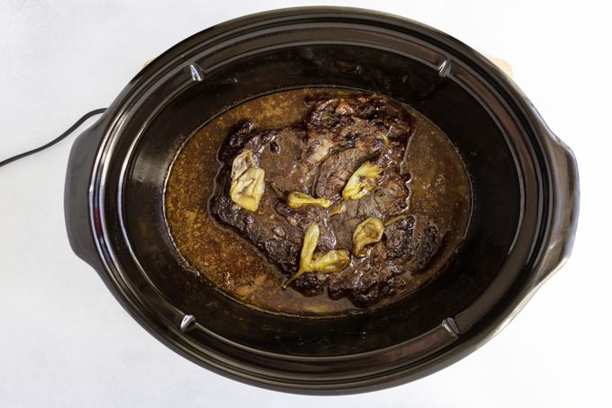 Mississippi Pot Roast cooked in slow cooker