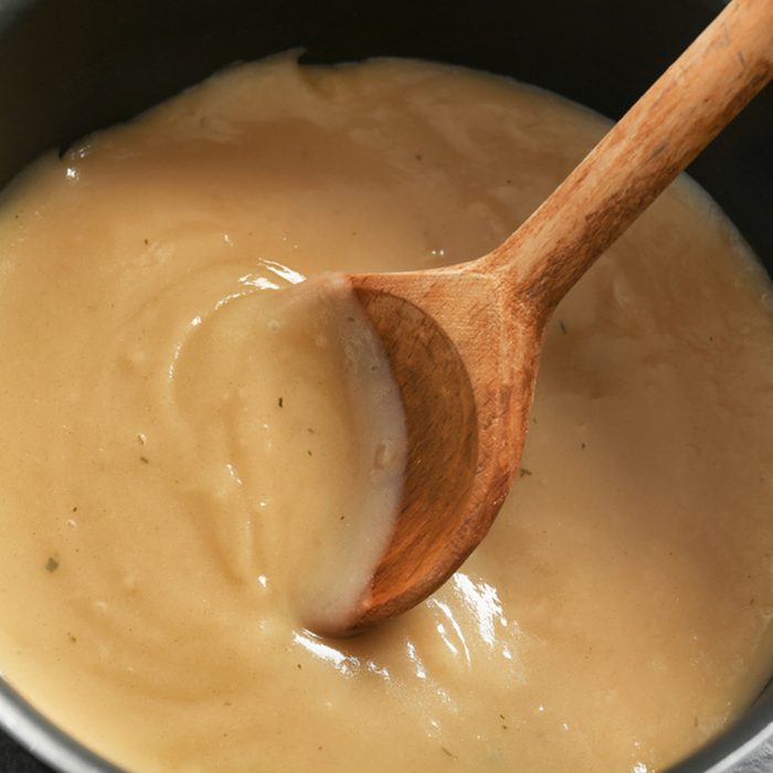 Tasty turkey gravy in saucepan