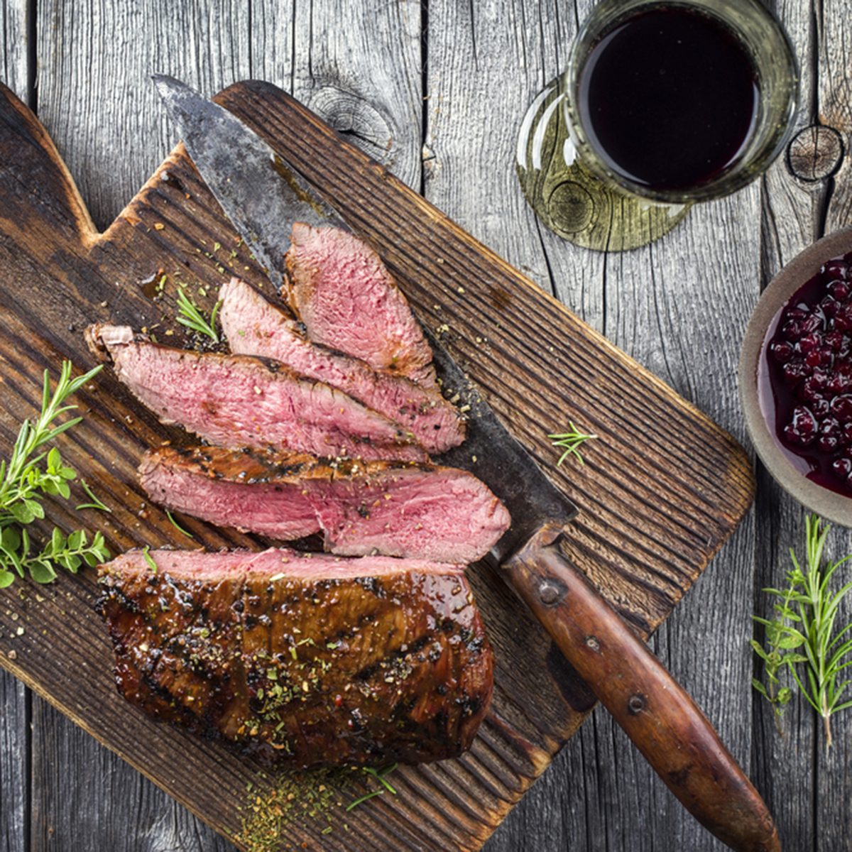 Venison Steak on old Cutting Board