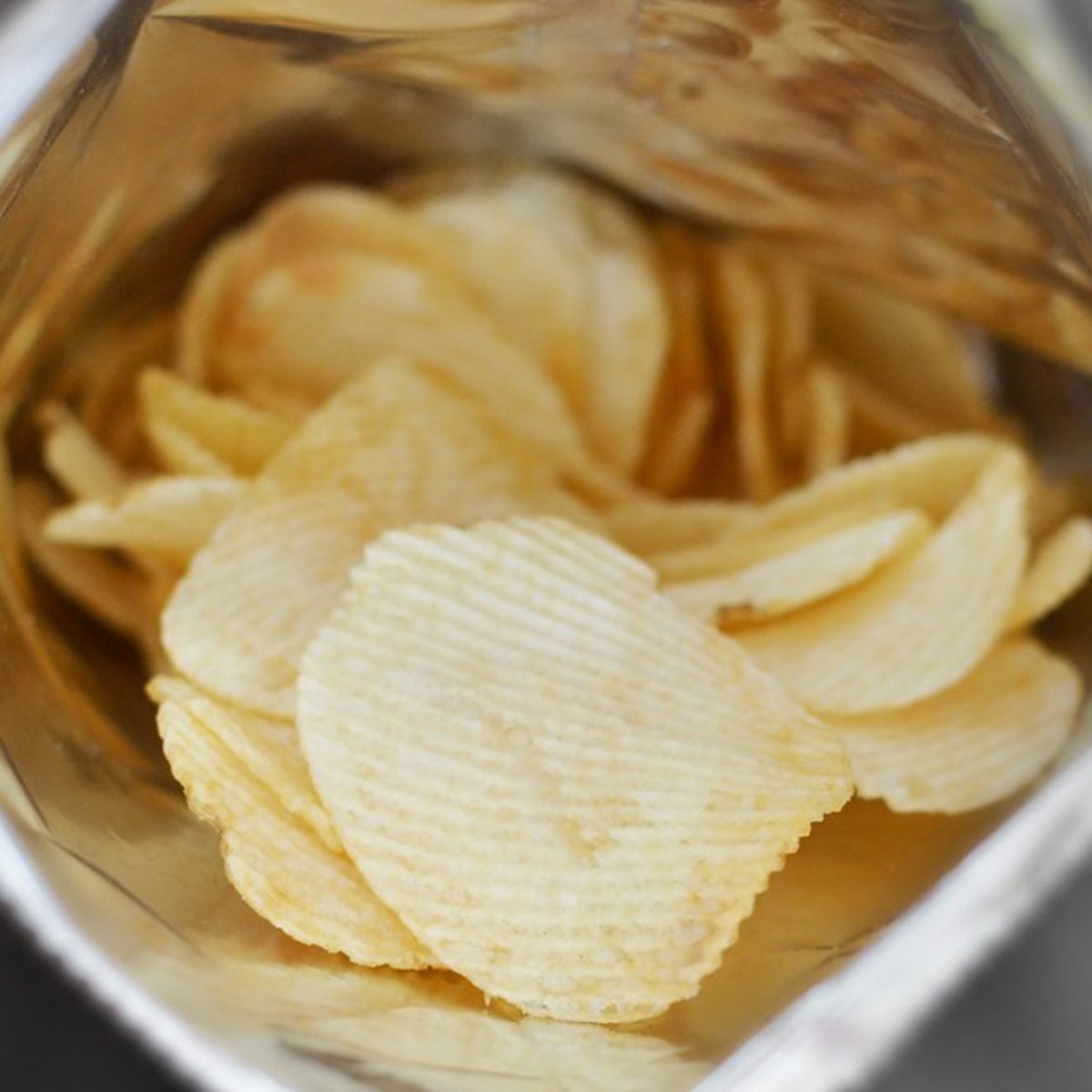 Open bag of potato chips