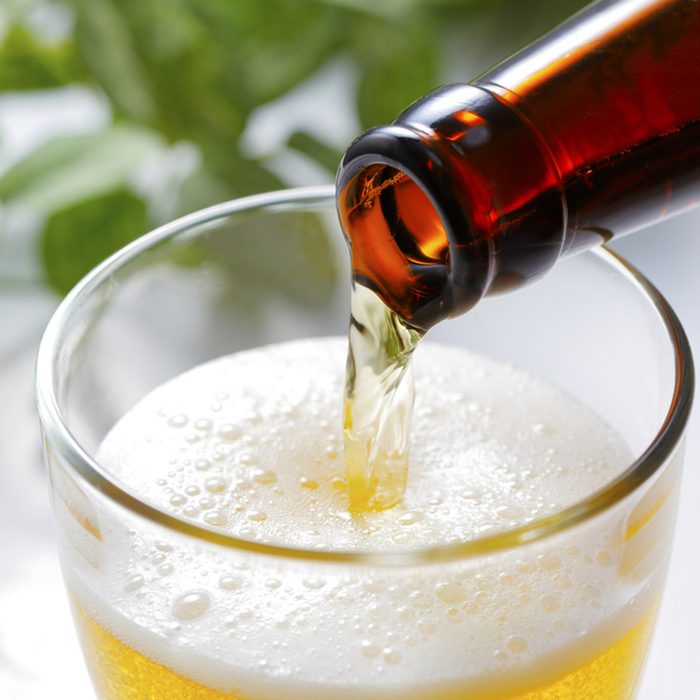 Pouring beer into glass