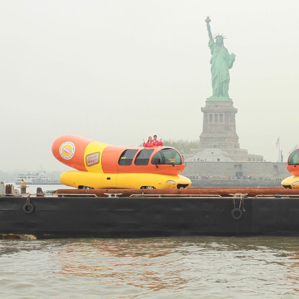 wienermobile and the statue of liberty