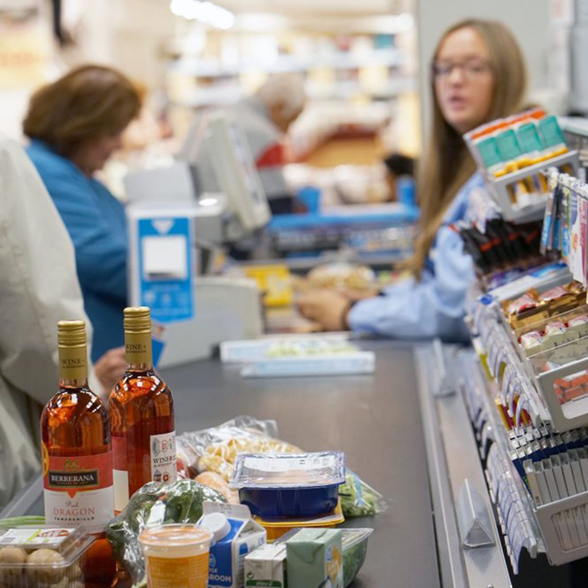 People waiting in line at the check-out