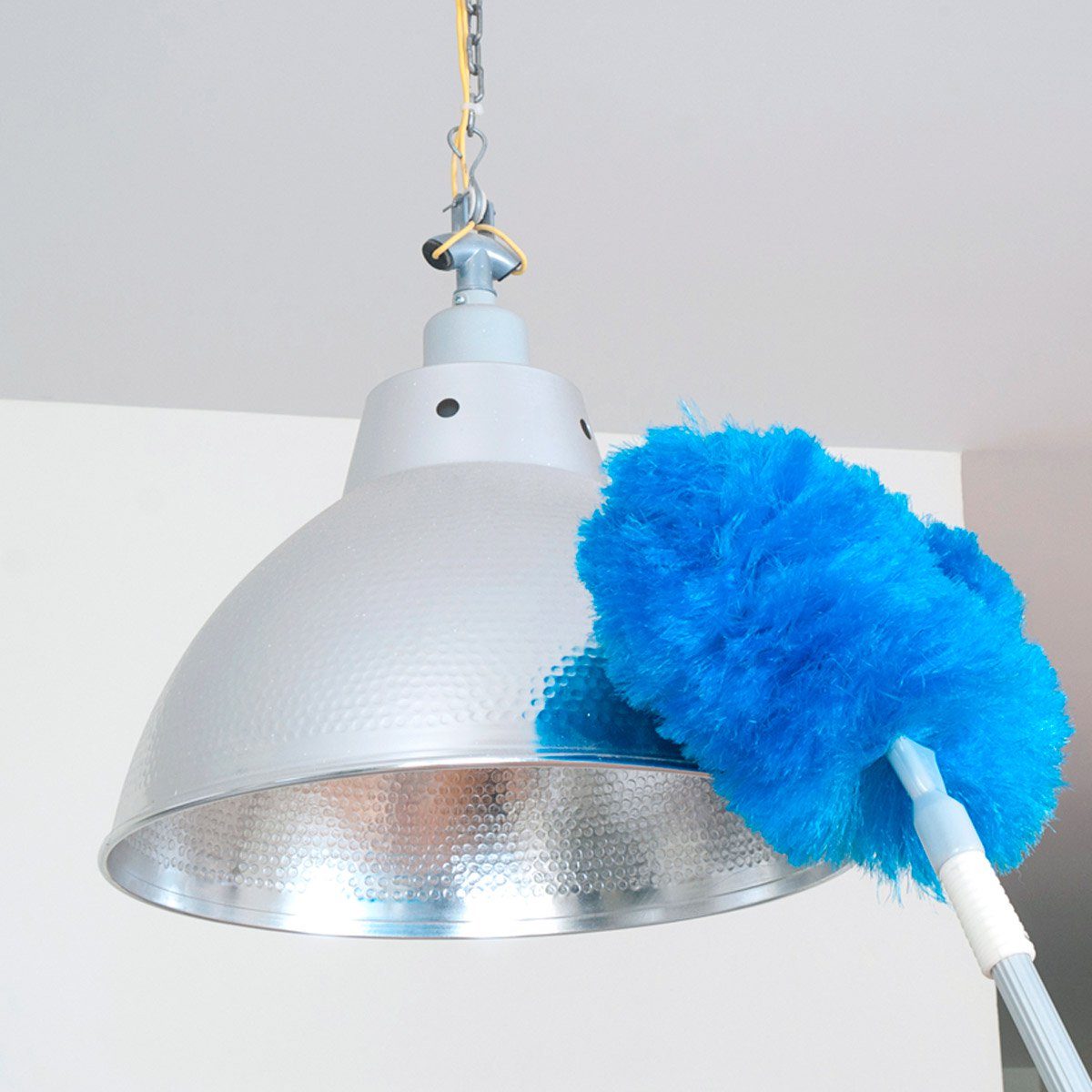 Cleaning light with duster on pole