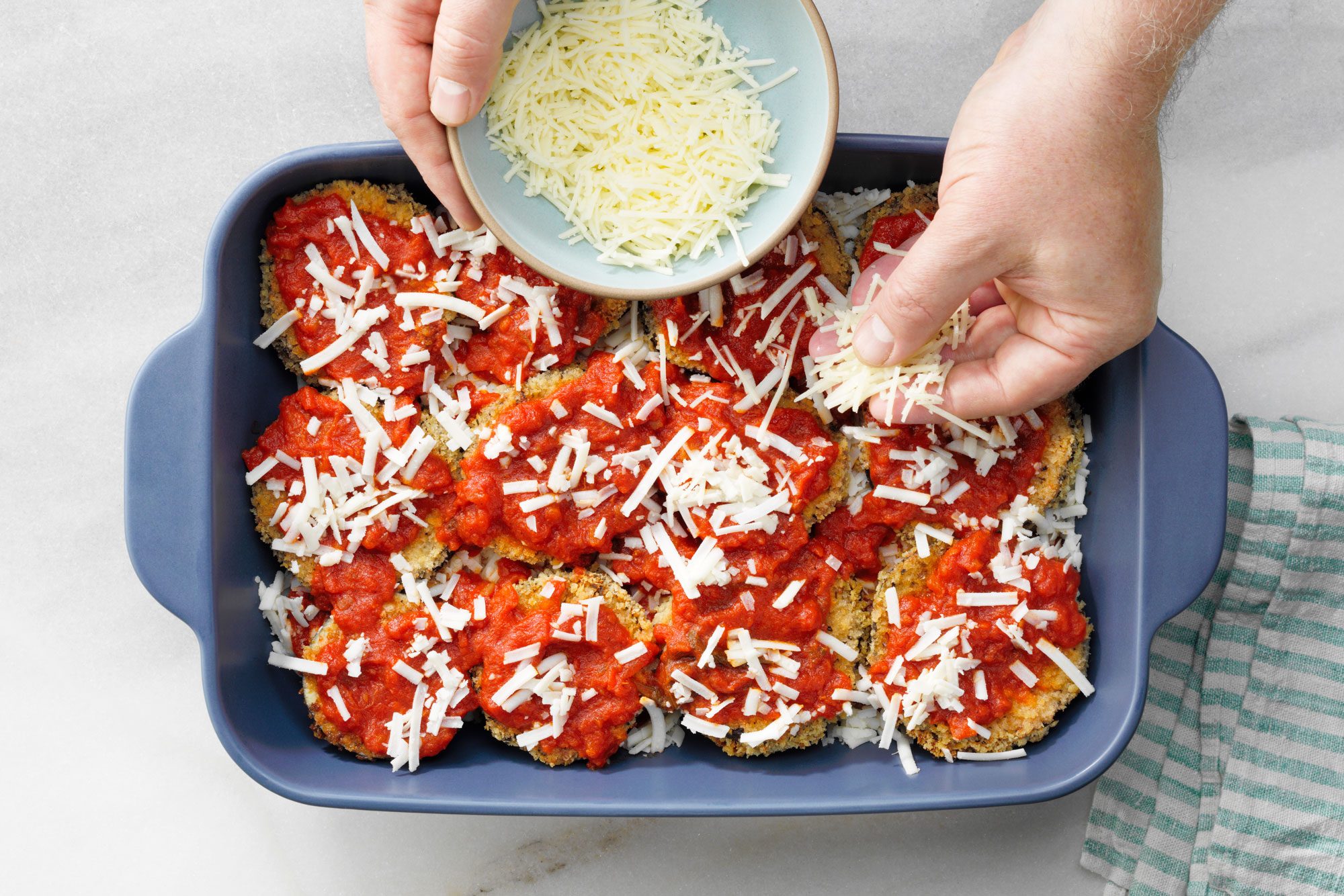 Assemble vegan eggplant Parmesan