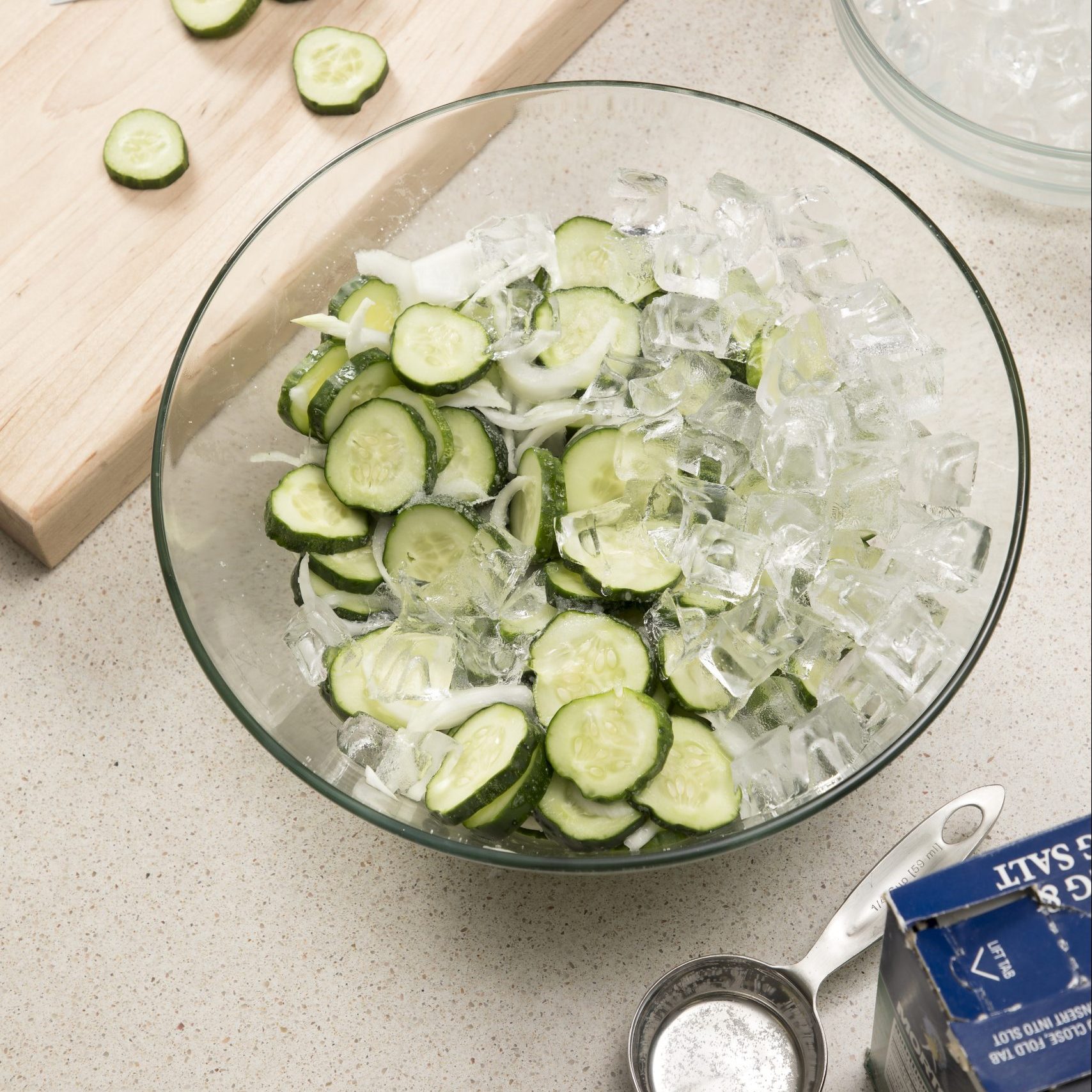 Combine Ice Cucumbers Onion And Salt