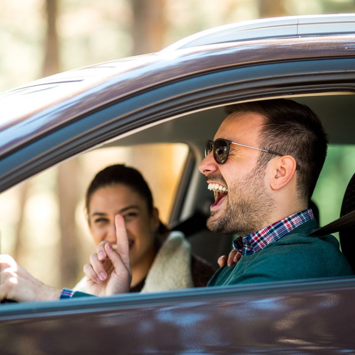 Couple having fun on roadtrip; Shutterstock ID 1412623895; Job (TFH, TOH, RD, BNB, CWM, CM): TOH Road Trip Games
