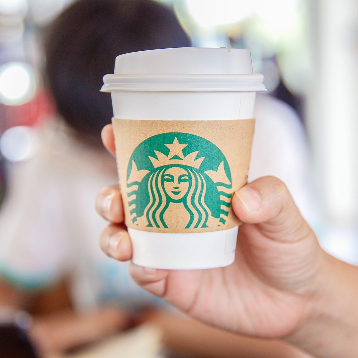 Espresso Blended Beverages served in the hand inside of starbuck shop at Siam Paragon, Bangkok, Thailand.