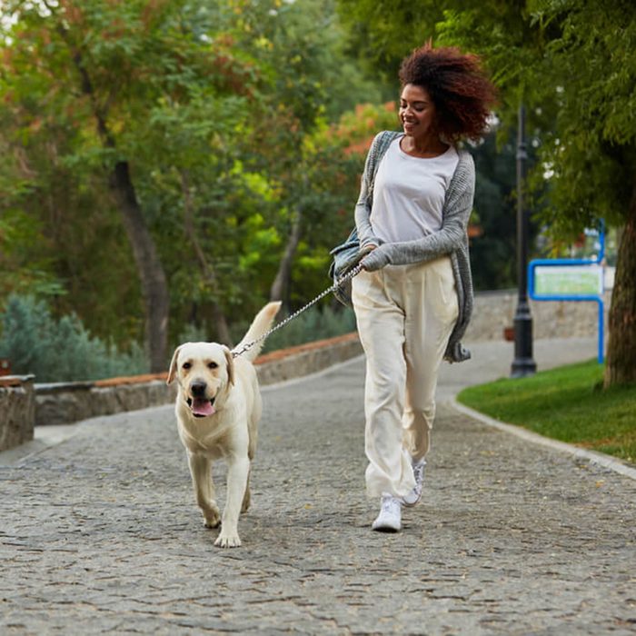 Woman walking her dog