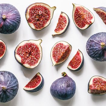 sliced figs on a white background
