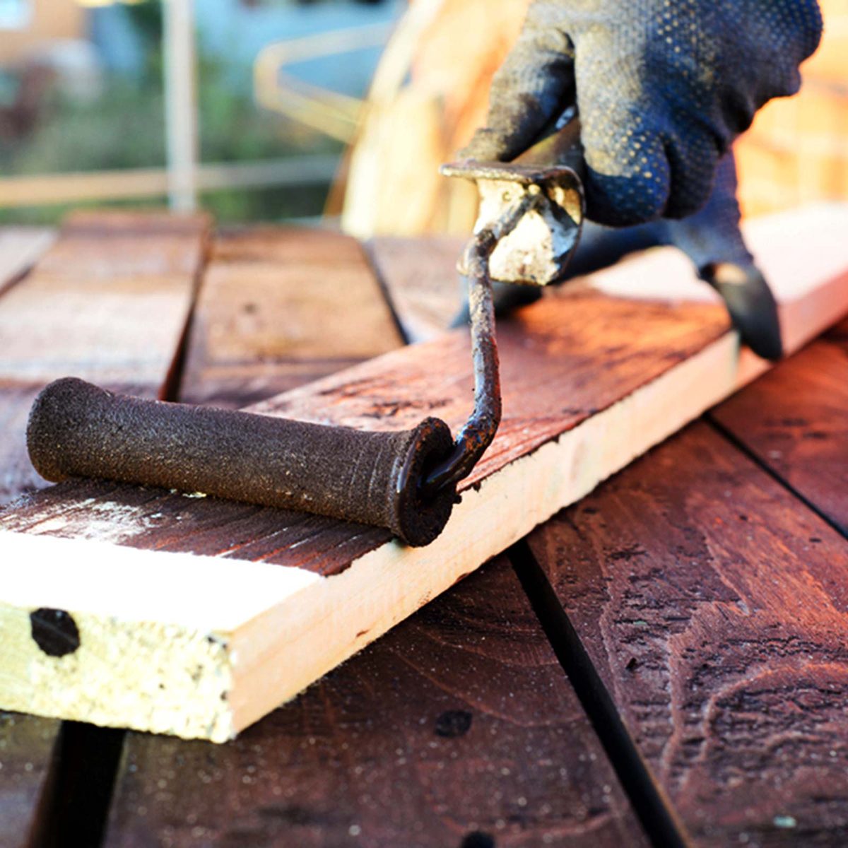 Rolling paint onto a board