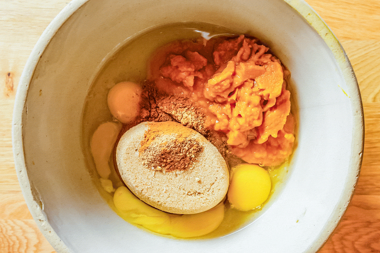 Mixing eggs, pumpkin, brown sugar, cinnamon, salt, cloves, nutmeg, ginger and Milk to make filling for Dairy Free Pumpkin Pie