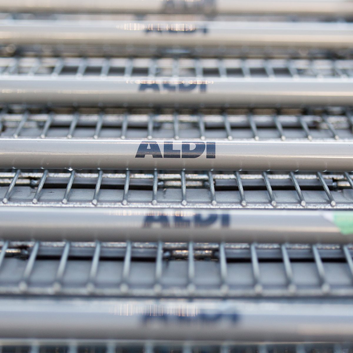 BRISTOL, ENGLAND - NOVEMBER 18: Aldi shopping trolleys are stacked outside a branch of the supermarket on November 18, 2015 in Bristol, England. As the crucial Christmas retail period approaches, all the major supermarkets are becoming increasingly competitive to retain and increase their share of the market. (Photo by Matt Cardy/Getty Images)