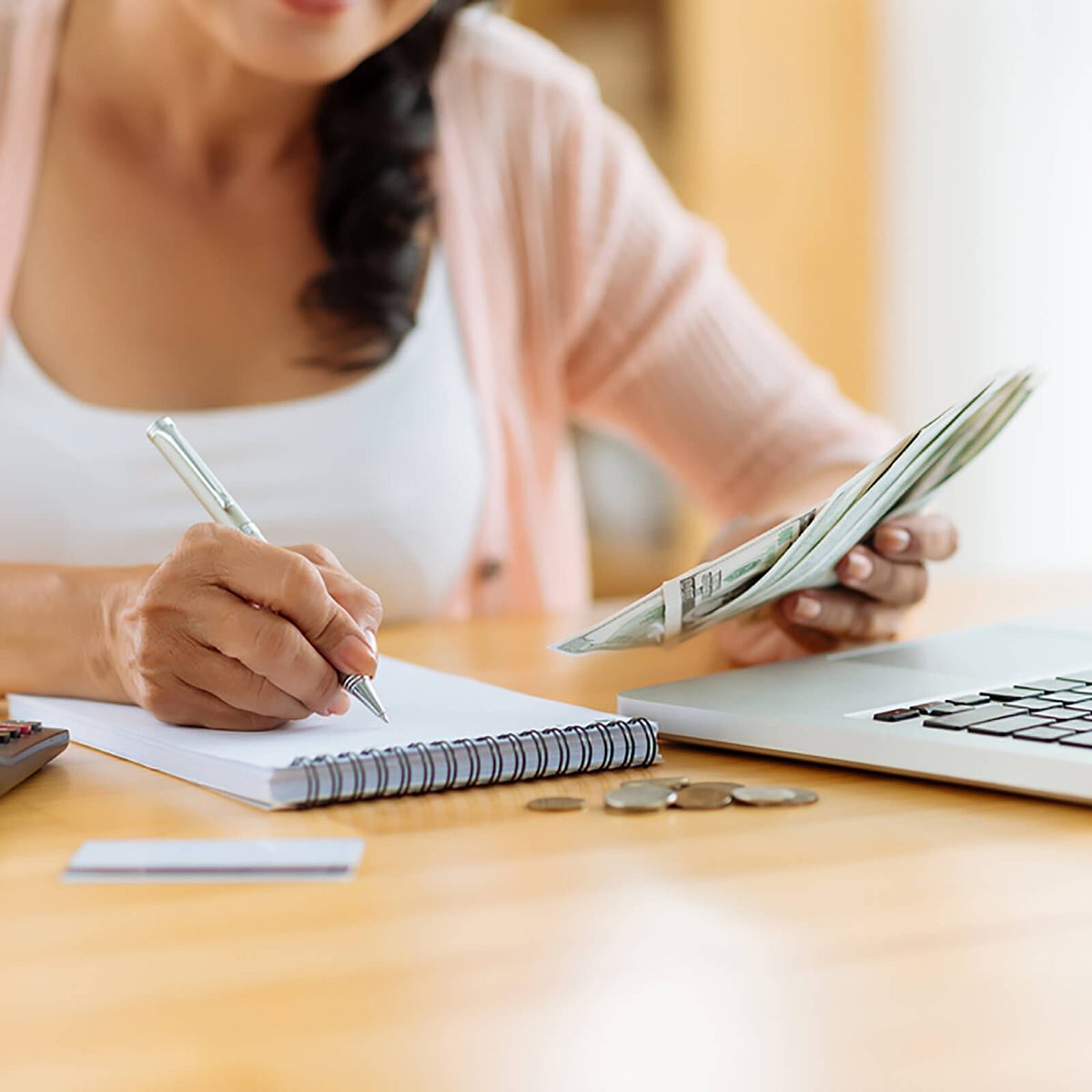 Woman distributing family budget; Shutterstock ID 243661255; Job: RD