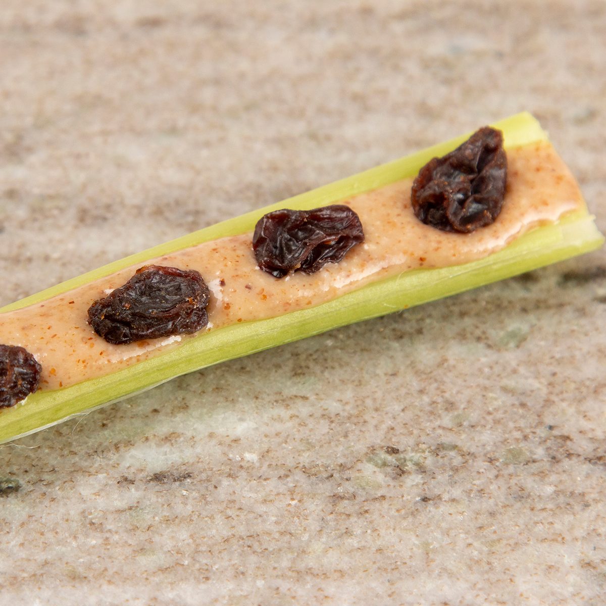 A Healthy Kid Friendly Snack of Celery and Nut Butter