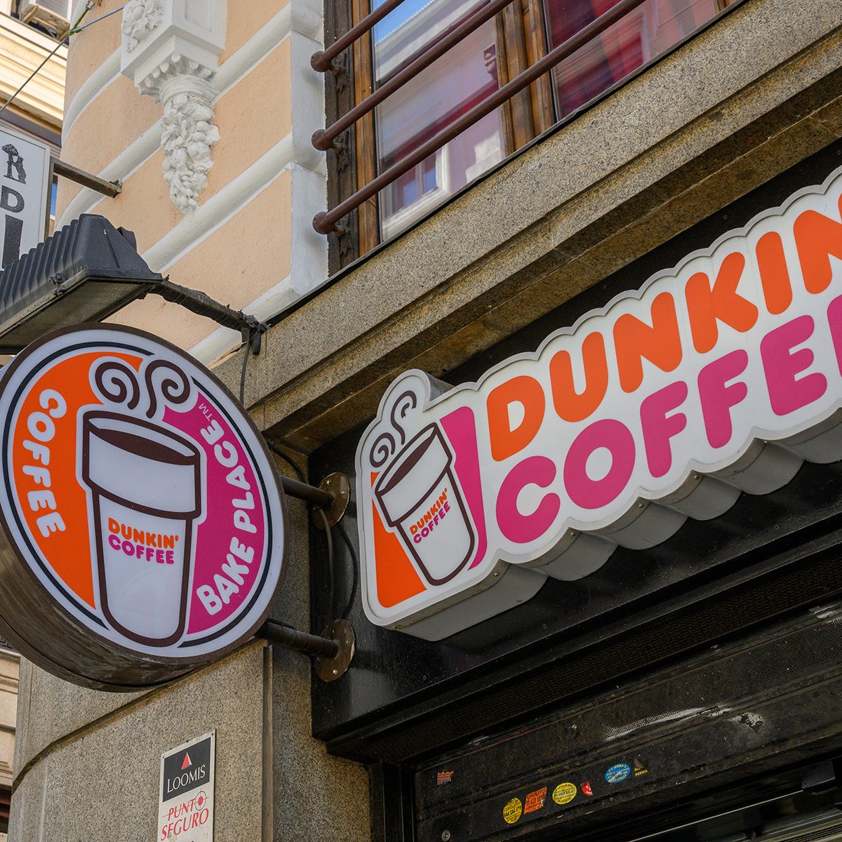 MADRID, SPAIN - MAY 04: Street sign outside Dunkin